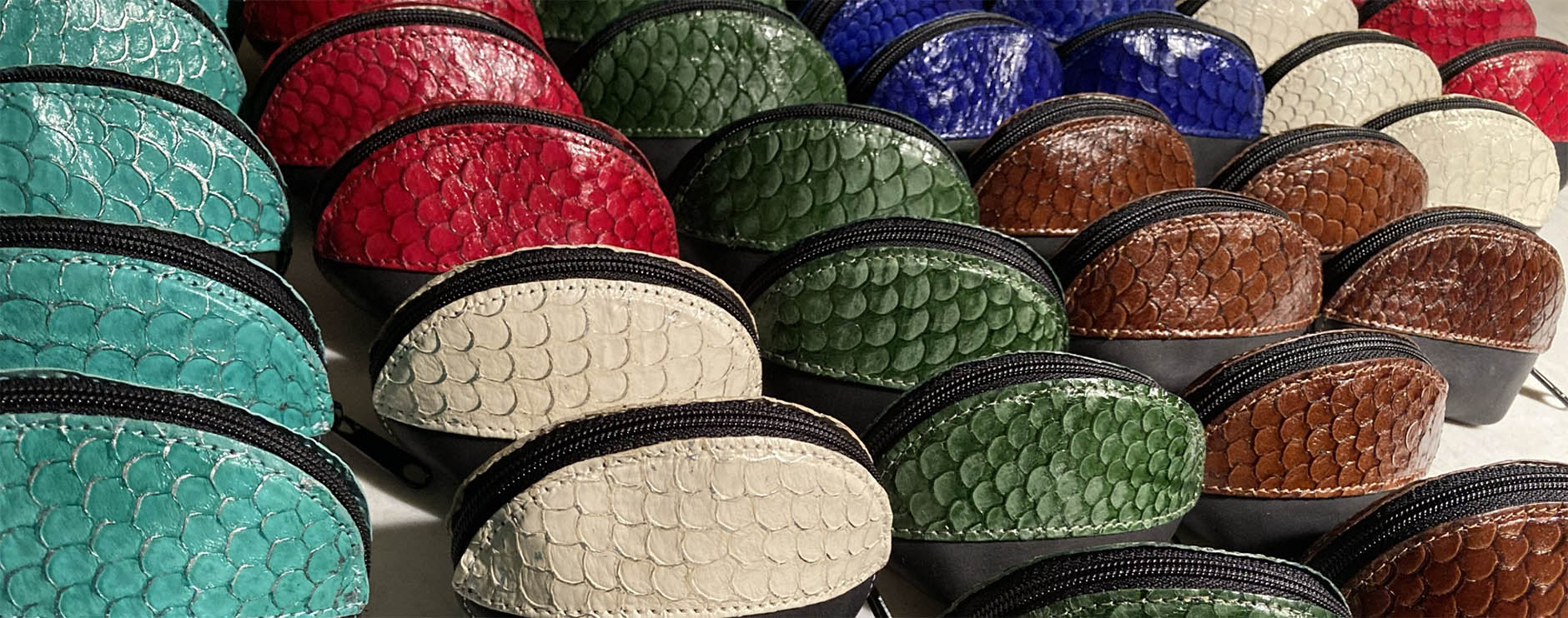 Oyster purse case made using sustainable and renewable tilapia fish skin leather.  Cow leather body, fish skin leather top. unique and different.  earbud, charging cord case holder, tech case, small items as contact case, mints, cochlear. handmade in USA