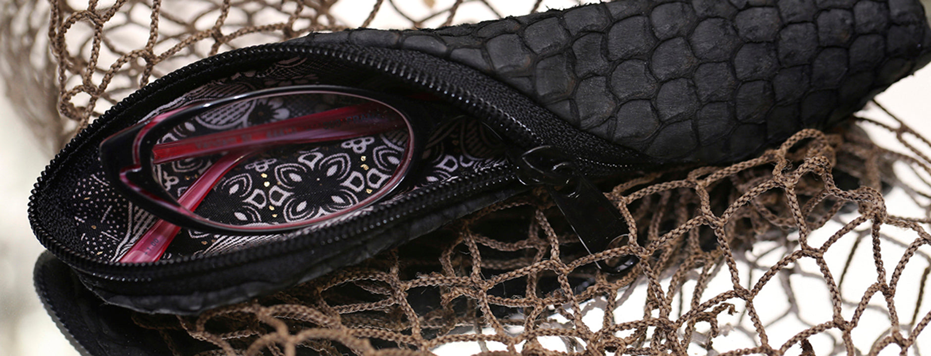 This unique, different accessory case purse is made using a sustainable and renewable tilapia fish skin leather.  It will hold PPE, facemask, eyelglasses, pens, makeup, costmetics, epipen, insulin pen, crochet hooks, double pointed needles, toothbrush
